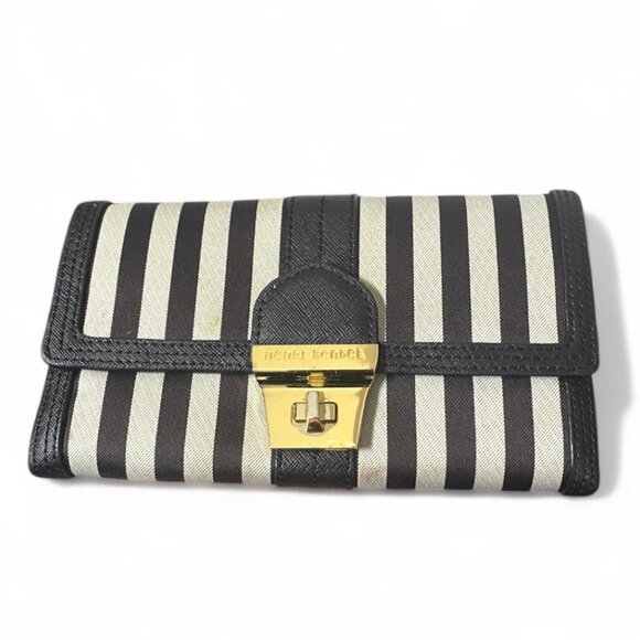 HENDRI BENDEL - BI FOLD TWIST LOCK WALLET BLACK AND WHITE STRIPED GOLD HARDWARE - Picture 1 of 4